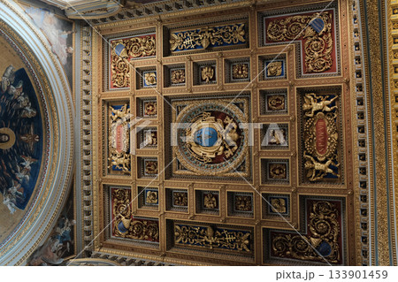 Archbasilica of Saint John Lateran interior Rome golden coffered ceiling marble columns statues ornate chapels baptistery and apse Catholic basilica Italy. High quality photo 133901459