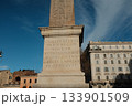 Lateran Obelisk in Piazza San Giovanni in Laterano Rome under blue sky ancient Egyptian granite monument with Latin base inscriptions city square landmark travel Italy. High quality photo 133901509