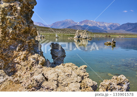 Tufa Towers Reflected in Clear Mono Lake Water with Sierra Nevada Mountains Tufa Towers Reflected in Clear Mono Lake Water with Sierra Nevada Mountains 133901578