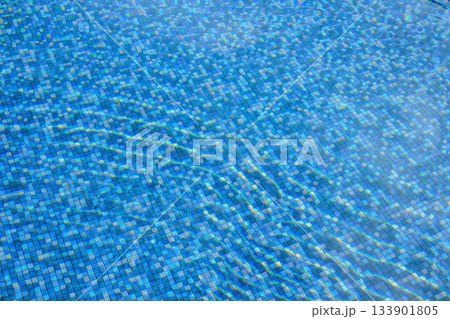 Swimming pool water surface and ripple wave with blue mosaic tiles 133901805