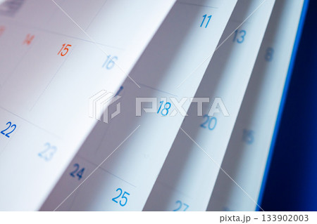 Abstract blur calendar page flipping sheet close up background business schedule planning appointment meeting concept Abstract blur calendar page flipping sheet close up background business schedule planning appointment meeting concept 133902003