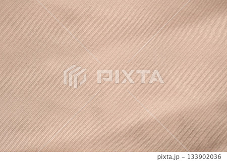 beige color fabric texture background closeup beige color fabric texture background closeup 133902036