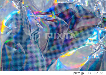 Holographic rainbow wrinkled foil iridescent texture abstract hologram background 133902183