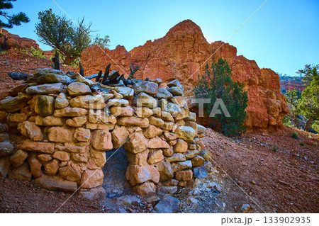 Stone Hut and Red Rock Formations on Arches Trail in Utah Desert Landscape Stone Hut and Red Rock Formations on Arches Trail in Utah Desert Landscape 133902935
