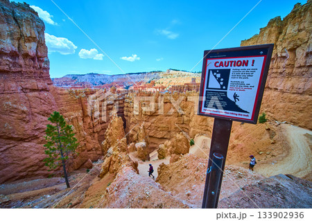 Bryce Canyon Wall Street Navajo Loop Trail Caution Sign and Switchbacks Utah Bryce Canyon Wall Street Navajo Loop Trail Caution Sign and Switchbacks Utah 133902936