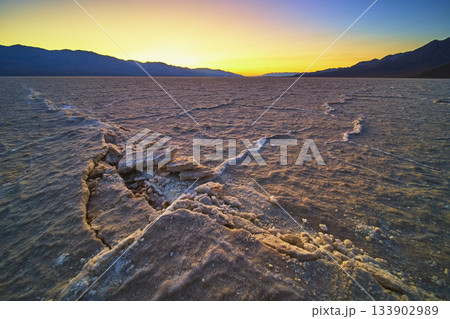 Golden Hour Salt Flats Landscape in Badwater Basin Death Valley Golden Hour Salt Flats Landscape in Badwater Basin Death Valley 133902989