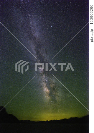Milky Way Night Sky Over Badwater Basin with Distant Desert Silhouette Milky Way Night Sky Over Badwater Basin with Distant Desert Silhouette 133903290