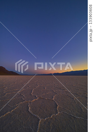 Salt Flats Pattern at Twilight in Badwater Basin Death Valley Desert Landscape 133903608