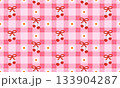 Pink gingham background and cherries tied bows, with small white daisy flower seamless pattern design. Vector illustration sweet, retro picnic style 133904287