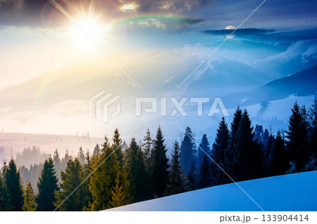 winter solstice landscape. day and night time change concept. fir trees on snow covered hill with sun and moon. place in mountains. winter wonderland background for harmony and progress calendar winter solstice landscape. day and night time change concept. fir trees on snow covered hill with sun and moon. place in mountains. winter wonderland background for harmony and progress calendar 133904414