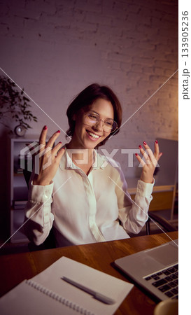 Woman expressing emotions during online coaching at learning session Woman expressing emotions during online coaching at learning session 133905236