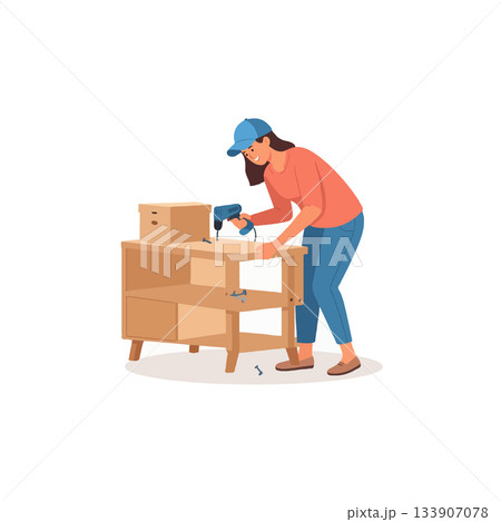 Focused craftswoman diligently assembles furniture with electric screwdriver in her workshop 133907078