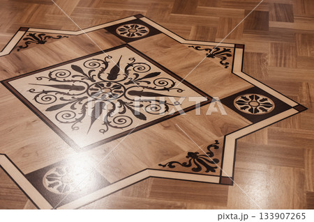 Wooden parquet made of different wood types. Architecture background Wooden parquet made of different wood types. Architecture background 133907265