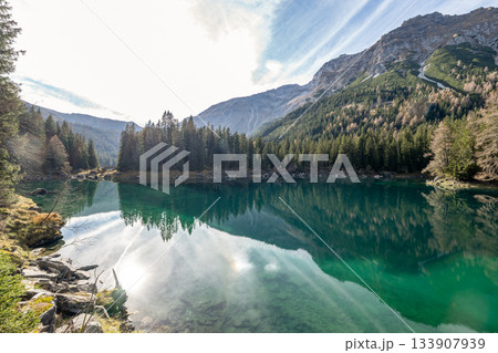 Summer time at romantic forest Lake Obernberg scenic mountain lakes landscape in Austria, Tyrol Summer time at romantic forest Lake Obernberg scenic mountain lakes landscape in Austria, Tyrol 133907939