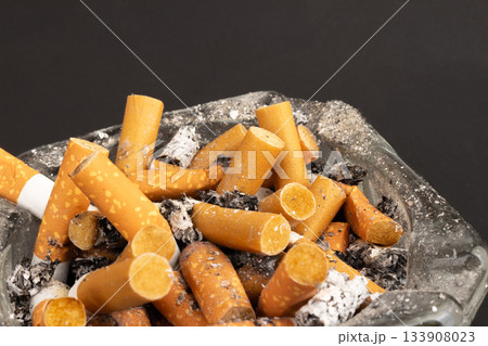cigarette butts torn on black background ashtray cigarette butts torn on black background ashtray 133908023