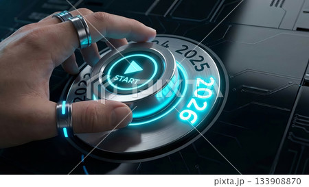 Finger pressing metallic start button with glowing 2026 text and futuristic interface. Finger pressing metallic start button with glowing 2026 text and futuristic interface. 133908870