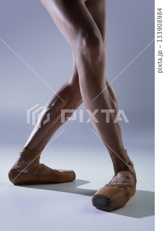 Ballet legs in relaxed crossed stance with emotional softness and balance Ballet legs in relaxed crossed stance with emotional softness and balance 133908984