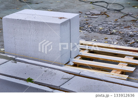 Wooden pallet with cellular aerated concrete blocks,ready to lay bricks 133912636