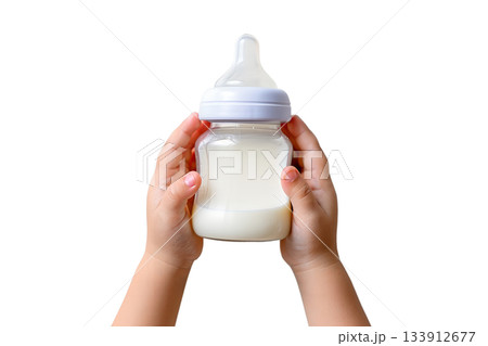 Baby's hands grasping baby bottle full of milk, isolated on transparent background for parenting and infant care designs 133912677