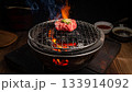 Grilling Wagyu Beef on Japanese BBQ Grill with Flames 133914092
