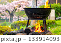Outdoor Fire Pit Burning with Flames and Smoke 133914093