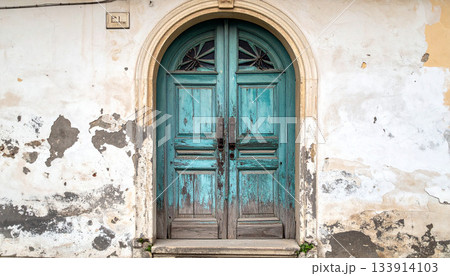 Old Weathered Blue Door in Stone Wall Old Weathered Blue Door in Stone Wall 133914103