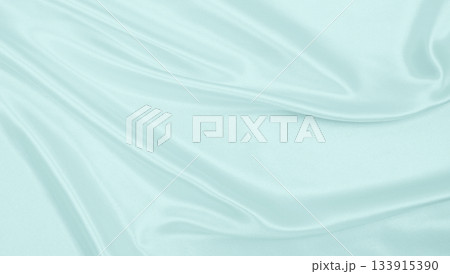 Smooth elegant blue silk or satin luxury cloth texture as abstract background. Luxurious background design Smooth elegant blue silk or satin luxury cloth texture as abstract background. Luxurious background design 133915390