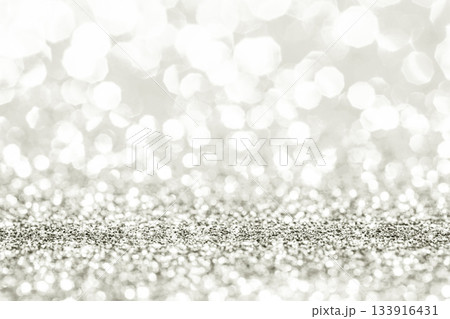 Silver glitter texture creating a sparkling bokeh background. Color of 2026 year dancer in the white cloud Silver glitter texture creating a sparkling bokeh background. Color of 2026 year dancer in the white cloud 133916431