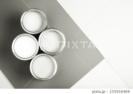White paint cans on monochrome background for home renovation. Color of 2026 year dancer in the white cloud White paint cans on monochrome background for home renovation. Color of 2026 year dancer in the white cloud 133916469