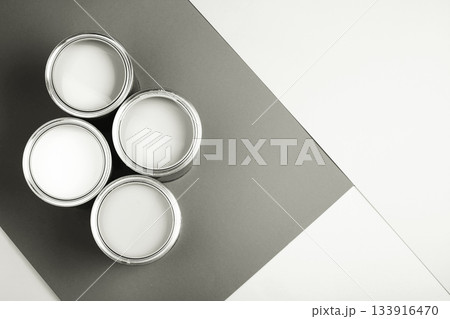 Four paint cans creating monochrome renovation concept. Color of 2026 year dancer in the white cloud 133916470