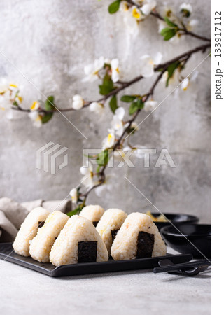 Onigiri, traditional japanese dish with rice 133917112