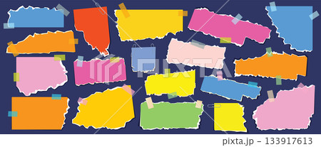 Colorful torn paper notes in various shapes taped to a dark background 133917613