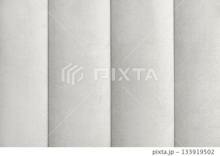 Demonstrating the colors of 2026 - Cloud Dancer. Close-up of a white gray textile abstract background stripes. Banner, copy space 133919502