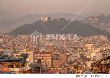 The cityscape of Kathmandu the capital city of Nepal during sunset. The city located in the bowl-shaped Kathmandu Valley of central Nepal. The cityscape of Kathmandu the capital city of Nepal during sunset. The city located in the bowl-shaped Kathmandu Valley of central Nepal. 133923095