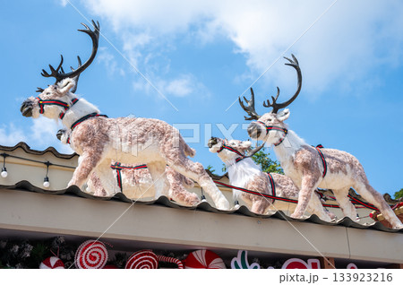 Reindeer doors decorated on the roof of house during Christmas festival. 133923216