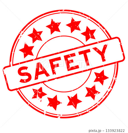 Grunge red safety word with star icon round rubber seal stamp on white background 133923822