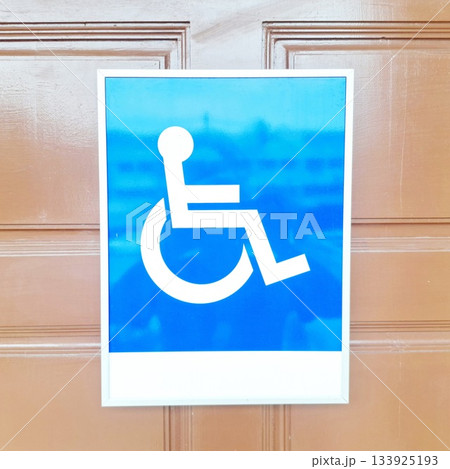 Blue Wheelchair Accessibility Sign for Public Facilities and Inclusive Service Areas 133925193