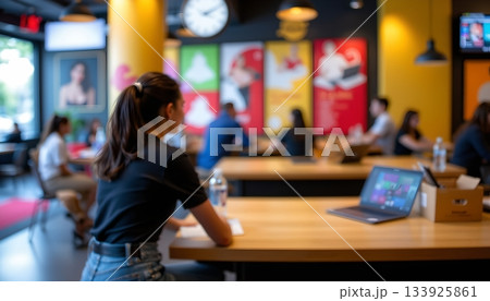 An interior view of a restaurant or c, where several people are seated around tables, engaged in conversations and meals An interior view of a restaurant or c, where several people are seated around tables, engaged in conversations and meals 133925861