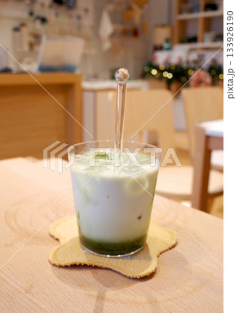 green tea latte in coffee shop 133926190