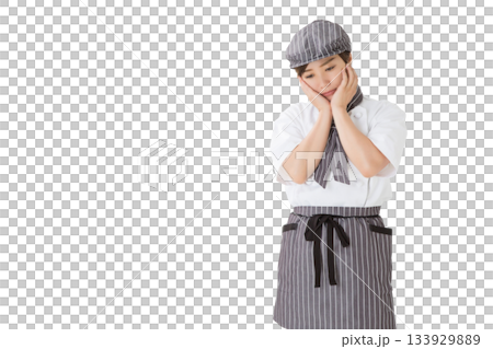 コックコートを着た女性（悲しい,トラブル,困る,悩む） 133929889