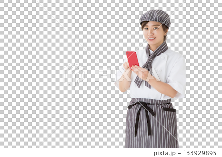 A woman wearing a chef's coat (smartphone, app, word of mouth) A woman wearing a chef's coat (smartphone, app, word of mouth) 133929895