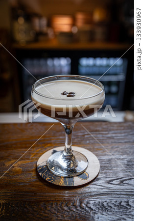 Espresso martini with a creamy foam layer Espresso martini with a creamy foam layer 133930967