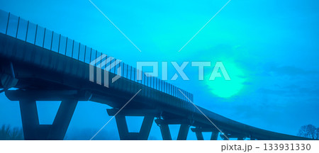 View of the road bridge in the night. Beautiful evening landscape with an overpass and dramatic sky. Italy 133931330