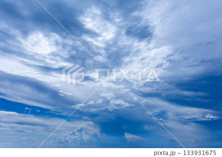 Expansive Sky With Clouds and Soft Light Over Calm Horizon Expansive Sky With Clouds and Soft Light Over Calm Horizon 133931675