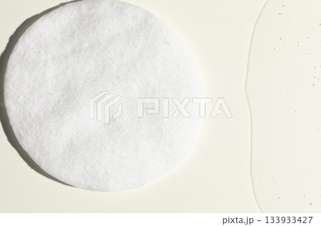 A cotton pad for removing makeup and micellar water. A cotton pad for removing makeup and micellar water. 133933427