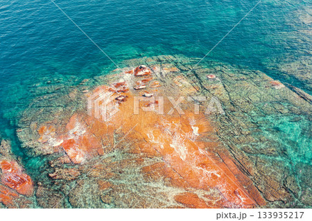 Seascape background. Drone view. Rocky seashore. Nature rocky background Seascape background. Drone view. Rocky seashore. Nature rocky background 133935217