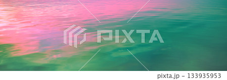 Sea water surface at sunset. View from above. Artistic pink blue gradient color. Horizontal banner Sea water surface at sunset. View from above. Artistic pink blue gradient color. Horizontal banner 133935953
