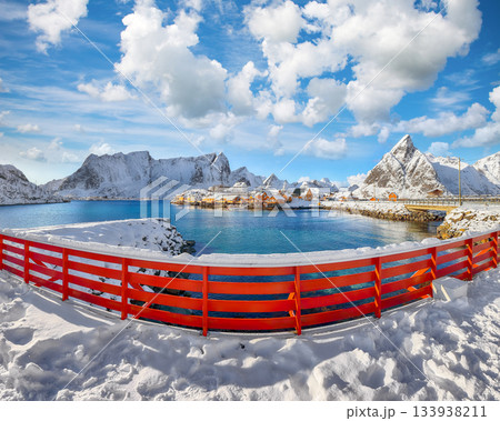 Remarkable view of Sakrisoy village and snowy mountaines on background 133938211