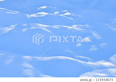 Fresh sparkling blue tone snow close-up, perfect as a tender winter season background texture 133938673