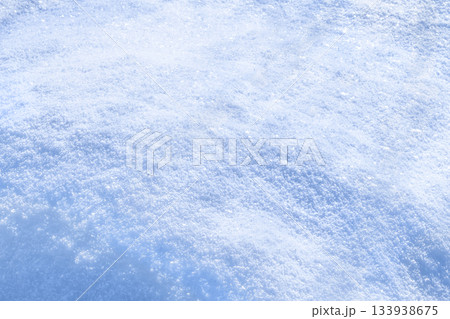 Fresh sparkling snow blue tone close-up, perfect as a winter season background texture Fresh sparkling snow blue tone close-up, perfect as a winter season background texture 133938675